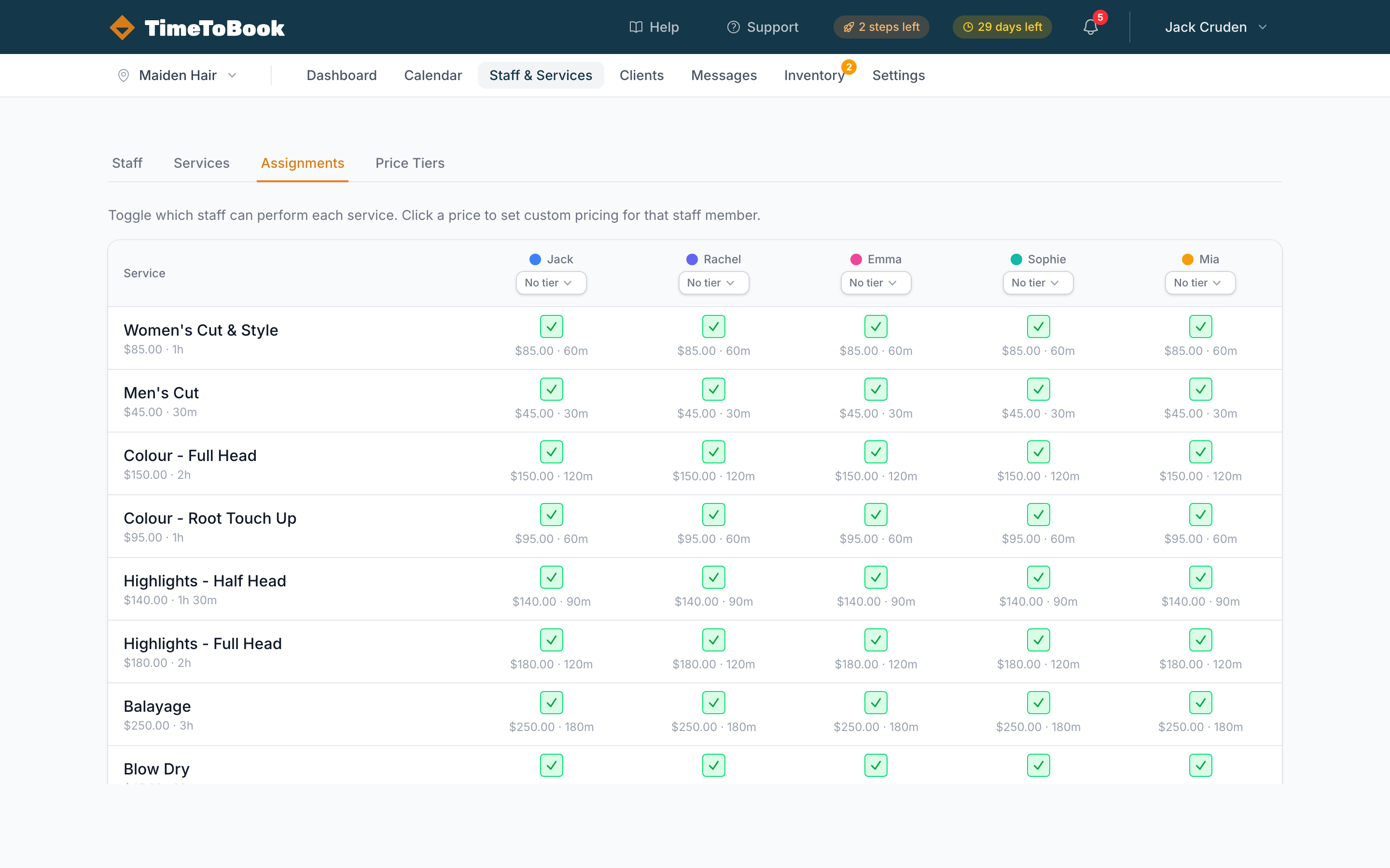The Assignments grid showing services down the rows and staff across the columns, with toggle cells